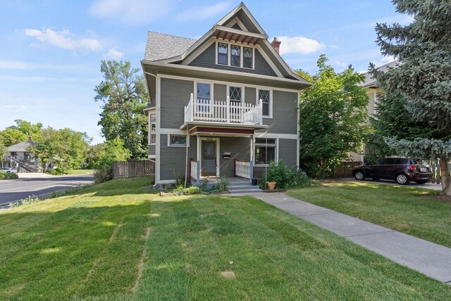 1434 W 8th Ave, Spokane, WA 99204 - view of front of house with a chimney and a balcony