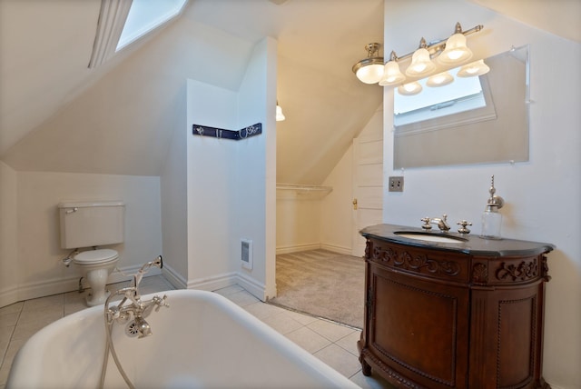 1434 W 8th Ave, Spokane, WA 99204 - full bath featuring tile patterned floors, a freestanding bath, vanity, and lofted ceiling
