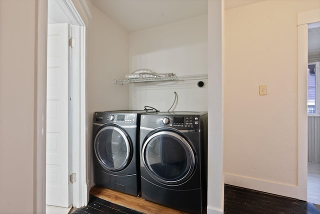 1434 W 8th Ave, Spokane, WA 99204 - laundry area featuring wood finished floors and washing machine and clothes dryer