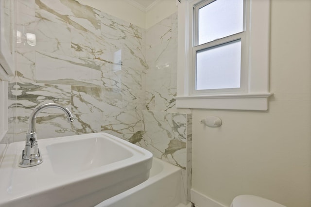 1434 W 8th Ave, Spokane, WA 99204 - bathroom featuring ornamental molding and a tub to relax in