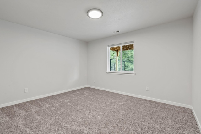 826 Thomas Ln, Newport, WA 99156 - carpeted empty room with baseboards