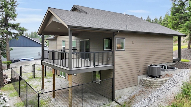 826 Thomas Ln, Newport, WA 99156 - back of house featuring a gate, a shingled roof, and a patio area