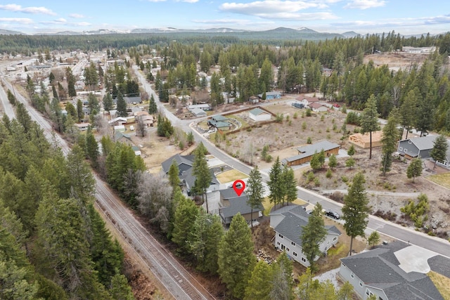 826 Thomas Ln, Newport, WA 99156 - aerial view of property and surrounding area with nearby suburban area and a mountain backdrop