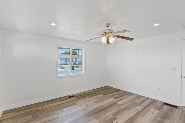4523 N Royal Ct, Spokane, WA 99205 - unfurnished room featuring a ceiling fan, wood finished floors, and recessed lighting