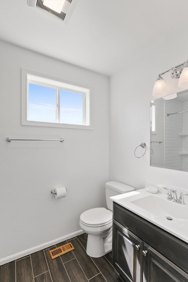 4523 N Royal Ct, Spokane, WA 99205 - full bath with vanity, a shower, and wood finished floors