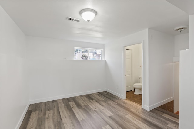 4523 N Royal Ct, Spokane, WA 99205 - unfurnished bedroom featuring wood finished floors and ensuite bath