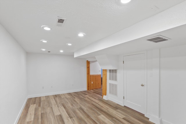 4523 N Royal Ct, Spokane, WA 99205 - finished basement featuring light wood-style flooring and recessed lighting