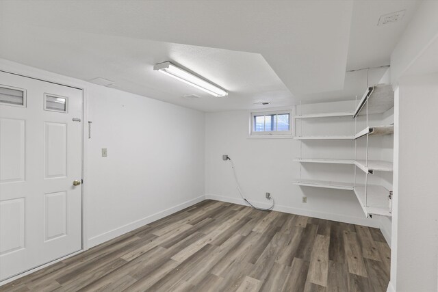 4523 N Royal Ct, Spokane, WA 99205 - below grade area with wood finished floors and baseboards