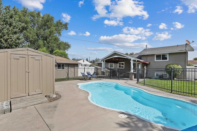 4523 N Royal Ct, Spokane, WA 99205 - view of swimming pool featuring a storage unit and a patio