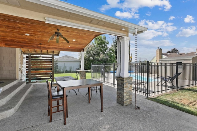 4523 N Royal Ct, Spokane, WA 99205 - view of patio with a ceiling fan, stairs, and outdoor dining area