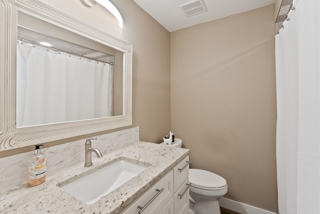 6221 N Highview Ln, Spokane Valley, WA 99217 - full bathroom featuring vanity and tasteful backsplash