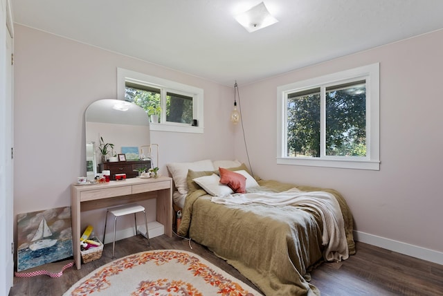 6221 N Highview Ln, Spokane Valley, WA 99217 - bedroom featuring multiple windows and wood finished floors