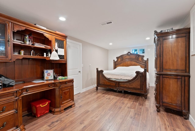 6221 N Highview Ln, Spokane Valley, WA 99217 - bedroom with light wood-type flooring, recessed lighting, and built in desk