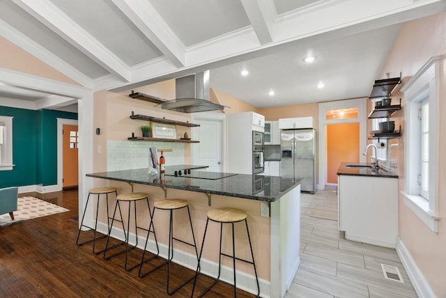 2026 W 9th Ave, Spokane, WA 99204 - kitchen featuring stainless steel appliances, open shelves, a peninsula, backsplash, and recessed lighting
