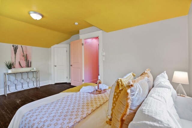 2026 W 9th Ave, Spokane, WA 99204 - bedroom with lofted ceiling and hardwood / wood-style floors