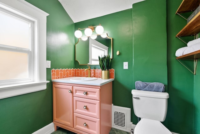 2026 W 9th Ave, Spokane, WA 99204 - half bathroom with vanity and lofted ceiling