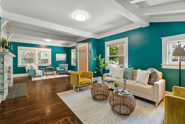 2026 W 9th Ave, Spokane, WA 99204 - living area featuring beamed ceiling, healthy amount of natural light, wood finished floors, and a fireplace with flush hearth