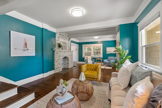2026 W 9th Ave, Spokane, WA 99204 - living room with wood finished floors, a fireplace, and crown molding