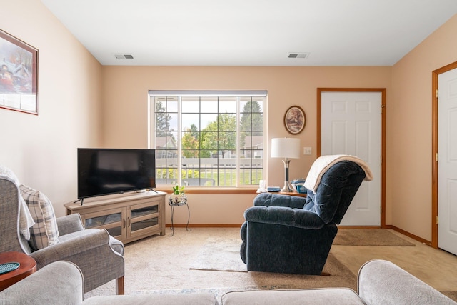 6902 N Capri Ln, Spokane, WA 99217 - carpeted living area featuring baseboards