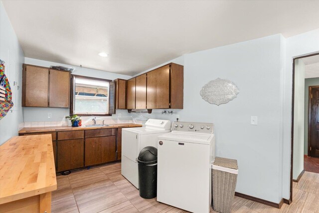1616 N Ritchey Rd, Reardan, WA 99029 - laundry area with cabinet space and washer and dryer