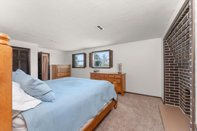 1616 N Ritchey Rd, Reardan, WA 99029 - bedroom featuring light carpet and a textured ceiling