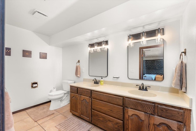 1616 N Ritchey Rd, Reardan, WA 99029 - bathroom featuring double vanity, tile patterned flooring, and ensuite bath