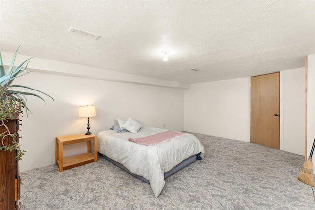 1616 N Ritchey Rd, Reardan, WA 99029 - bedroom featuring carpet floors and a textured ceiling