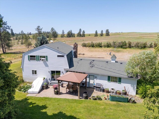 1616 N Ritchey Rd, Reardan, WA 99029 - rear view of house featuring a patio area, a gazebo, and a yard