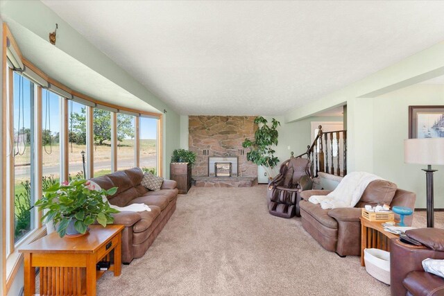 1616 N Ritchey Rd, Reardan, WA 99029 - living room with carpet, stairs, and a fireplace