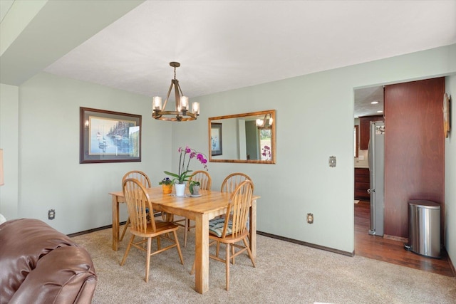 1616 N Ritchey Rd, Reardan, WA 99029 - dining area with a chandelier, light colored carpet, and recessed lighting