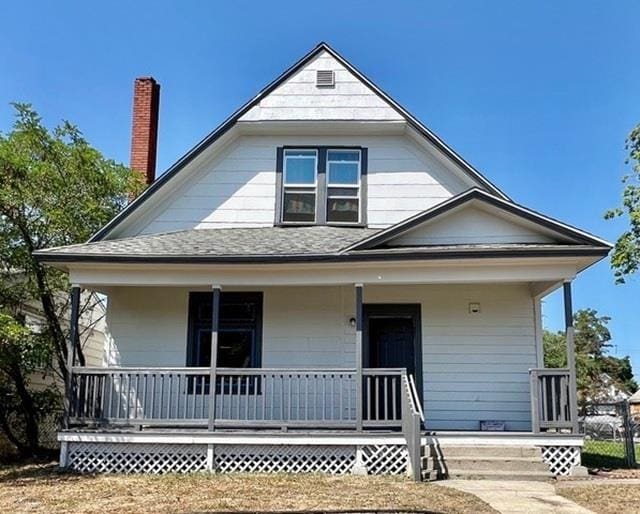 1304 W Maxwell Ave, Spokane, WA 99201 - view of front of home with a porch and a shingled roof