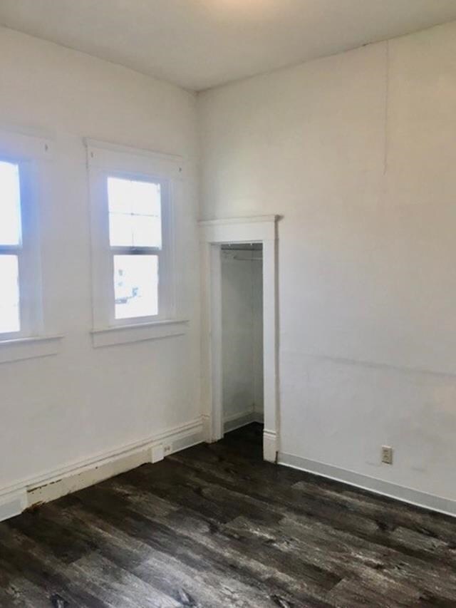 1304 W Maxwell Ave, Spokane, WA 99201 - unfurnished room with dark wood-style floors