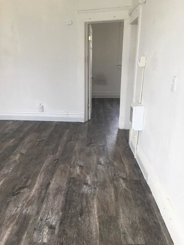 1304 W Maxwell Ave, Spokane, WA 99201 - unfurnished room featuring wood finished floors and baseboards
