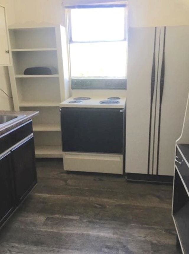 1304 W Maxwell Ave, Spokane, WA 99201 - kitchen with white appliances, dark wood-type flooring, open shelves, and white cabinetry