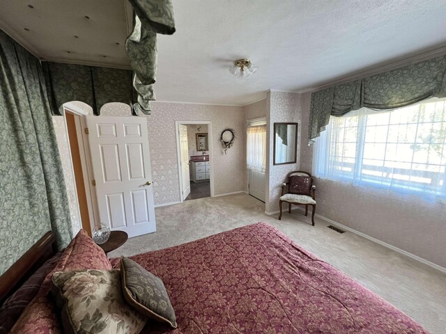 1703 W 25th Ave, Spokane, WA 99224 - bedroom with wallpapered walls, carpet, and crown molding