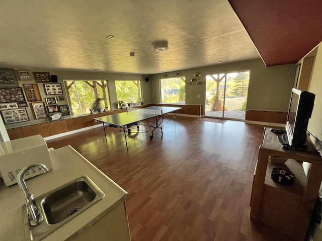 1703 W 25th Ave, Spokane, WA 99224 - rec room with wood finished floors