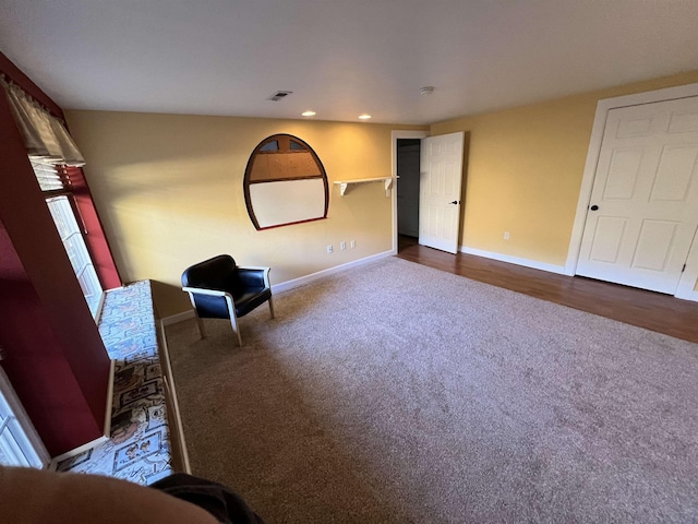 1703 W 25th Ave, Spokane, WA 99224 - living area featuring dark colored carpet and recessed lighting