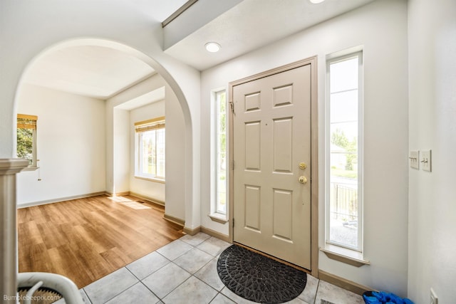 706 S Shelley Lake Ln, Veradale, WA 99037 - foyer entrance with arched walkways and light tile patterned floors
