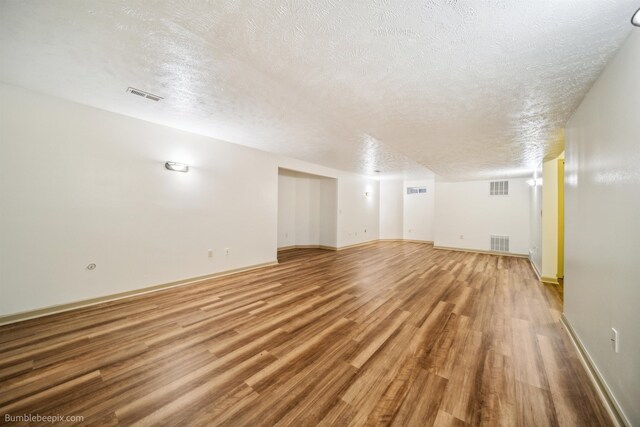 706 S Shelley Lake Ln, Veradale, WA 99037 - bonus room with a textured ceiling and light wood-style flooring