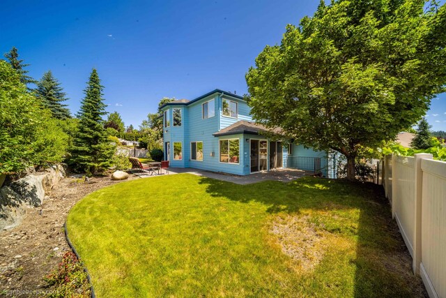 706 S Shelley Lake Ln, Veradale, WA 99037 - rear view of house with a patio