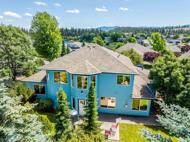706 S Shelley Lake Ln, Veradale, WA 99037 - view of patio / terrace with an outdoor living space with a fire pit