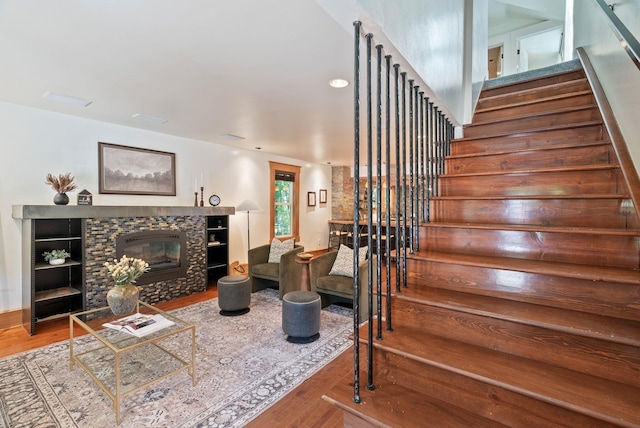 1420 W Main Ave, Spokane, WA 99201 - staircase with wood finished floors and a tiled fireplace
