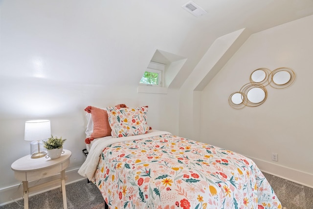 1420 W Main Ave, Spokane, WA 99201 - carpeted bedroom featuring vaulted ceiling