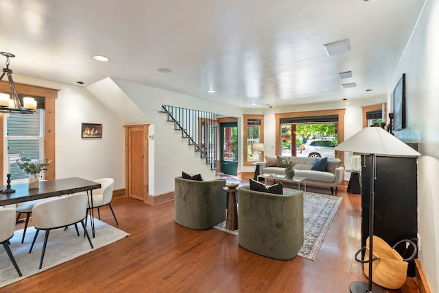 1420 W Main Ave, Spokane, WA 99201 - living room featuring stairway, wood finished floors, a chandelier, and recessed lighting