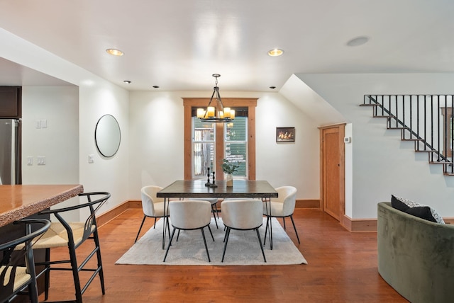 1420 W Main Ave, Spokane, WA 99201 - dining room with a chandelier, wood finished floors, stairs, and recessed lighting
