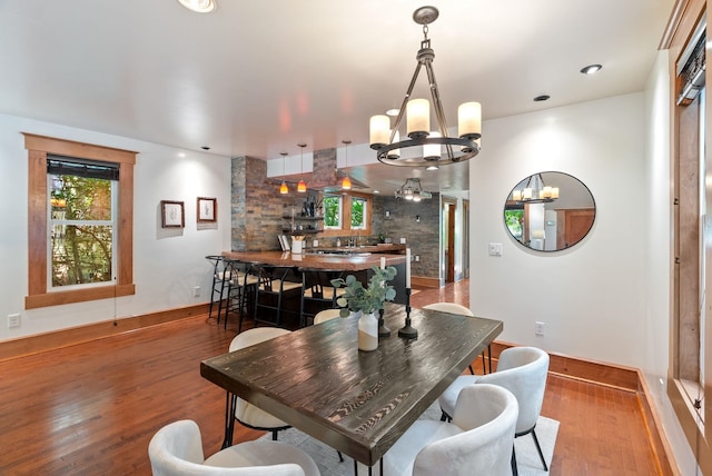1420 W Main Ave, Spokane, WA 99201 - dining room with a chandelier and wood finished floors