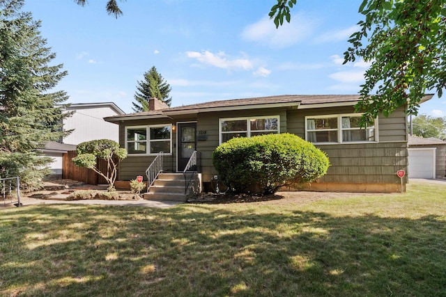 3218 E 24th Ave, Spokane, WA 99223 - view of front of house featuring a front lawn