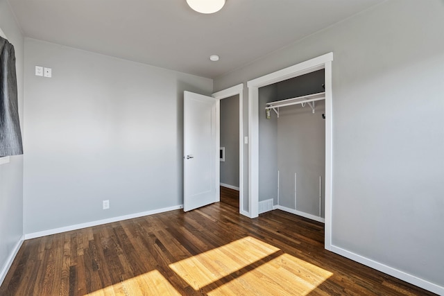 3218 E 24th Ave, Spokane, WA 99223 - unfurnished bedroom featuring wood finished floors and a closet