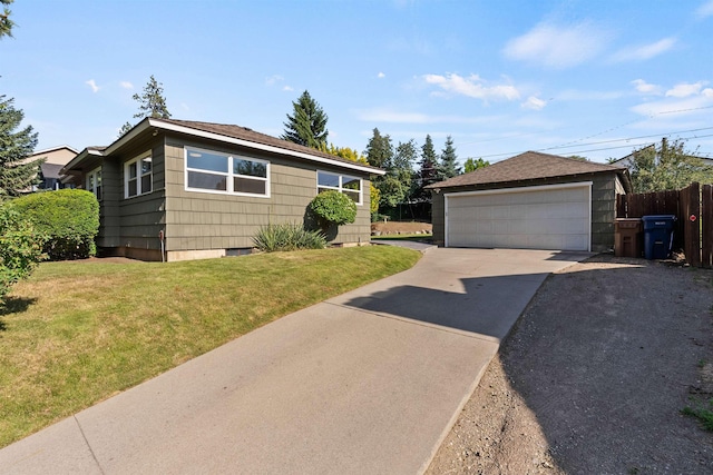 3218 E 24th Ave, Spokane, WA 99223 - view of front of house with an outbuilding and a detached garage