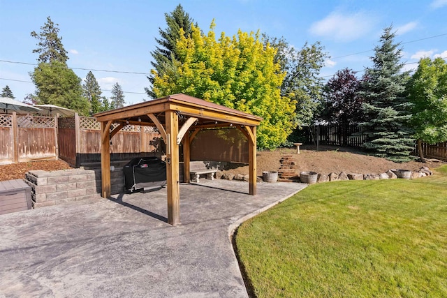 3218 E 24th Ave, Spokane, WA 99223 - fenced backyard featuring a gazebo and a patio area